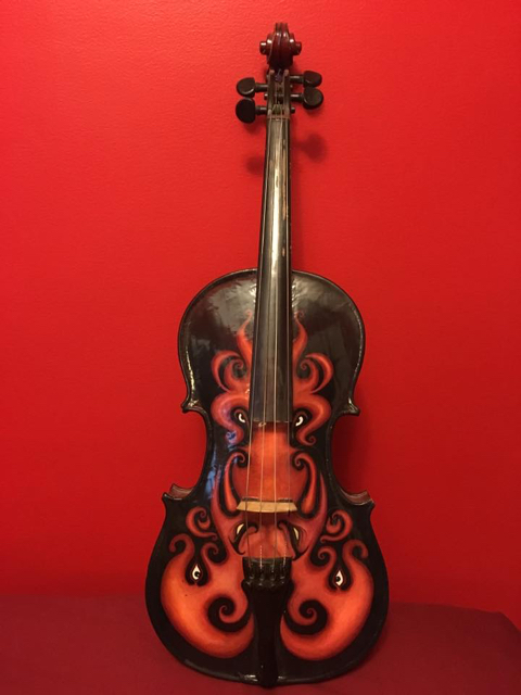 A viola, painted by Ty Semaka